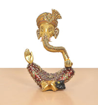 Ganesha brass idol head and arms with decorative meenakari, hands raised