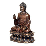 Buddha idol sculpture, side view with raised palm hand, jeweled blue-gold base