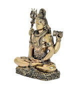 Seated Lord Shiva brass idol, side view, braided hair and jeweled ornaments