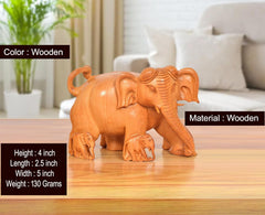 Wooden elephant showpiece, 4 in tall; carved trunk raised, small base