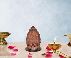 Brass Lord Shiva nine-face stupa idol with ornate etched details, bronze finish