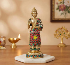 Brass standing Buddha idol with Abhaya mudra, red patterned robe and jeweled accents