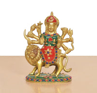 Durga Maa brass idol on lion base, red-green attire with jeweled multicolor accents
