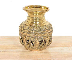 Bronze kalash with flared top and etched borders around the engraved body