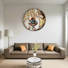 Circular wall hanging: Ganesha on swing playing flute, orange headdress and gold leaves