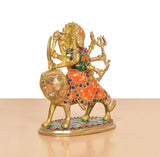 Durga Maa brass idol on lion, three-quarter view, four-armed pose with beadwork
