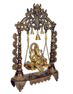 Brown and gold Ganesha swing, detailed frame with four hanging bells above seated Ganesha