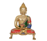 Seated brass Buddha idol in Dhyan mudra, front view, multicolor jeweled clothing.