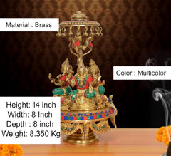 Brass idol with ornate parasol canopy over Lakshmi-Ganesha-Saraswati, multicolor, 14 in