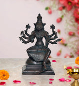 Varahi Vishnu idol figurine, seated with four arms, dark bronze with teal patina