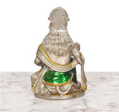 Brass Hanuman JI seated statue, back view with green cloth and ornamental base