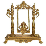 Brass Ganesha idol on swing with ornate frame and hanging chains, 13-inch height