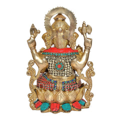 Back view of Brass Mangalkari Ganesh statue with jeweled waist and raised arms