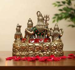 Shiv Parivar idol base with three seated figures, multicolor accents on robes