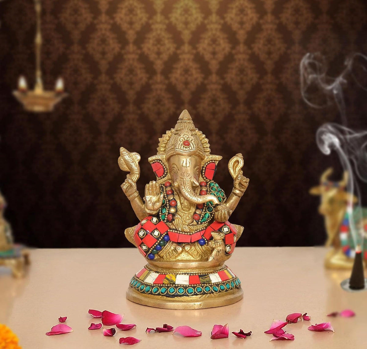 Brass Ganpati Bappa murti (6 inch) with red, blue, green jeweled attire, seated