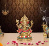 Brass Ganpati Bappa murti (6 inch) with red, blue, green jeweled attire, seated