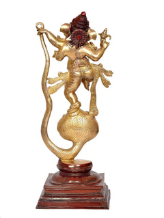 Brass Lord Ganesha dancing on serpent Shesha idol with red crown and gold finish