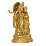 Gold-tone Radha Krishna brass idol statue, angled view with detailed drapery
