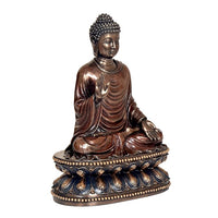 Buddha idol sculpture, three-quarter view with right hand raised, ornate pedestal