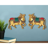 Brass Kamdhenu cow pair wall hanging with multicolour detailing, front view