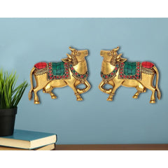 Brass Kamdhenu cow pair wall hanging with multicolour detailing, front view