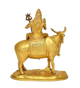 Brass seated Shiva on Nandi, ornate saddle pattern, trident detail statue
