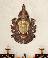 Brass Shiva face wall hanging mask with ornate arch, gold and dark brown detail