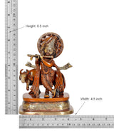 Brass Lord Krishna with cow figurine showing measurements: Height 6.5 inch