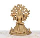 Dakshinamurti Shiva brass statue, seated pose with detailed jewelry and halo