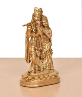 Golden Resin Radha Krishna idol, front view with flute and layered jewelry details