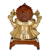Brass Ganesha idol back view with dark crown and gold ornaments on base