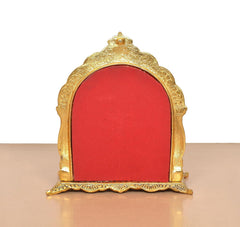 Metal Ram Darbar statue back: gold frame with red panel, no figures visible