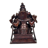 Brown brass Ganesha with Riddhi Siddhi idol statue, back view with round emblem
