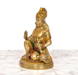 Brass Hanuman JI statue, side view seated on round base with detailed jewelry