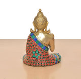 Rear 3/4 Brass Buddha idol seated, multicolor jeweled robe and head details