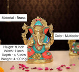 Ganpati Bappa murti in brass, multicolour accents, ornate seated figure, 9 inch