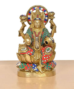 Brass Lakshmi idol with ornate crown and multicolor jewel-patterned garments