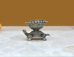 Superfine brass tortoise oil lamp diya with engraved bowl and four legs, front view