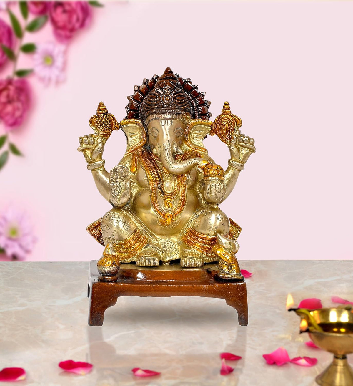 Brass Lord Ganesha idol statue with raised hands on wooden base