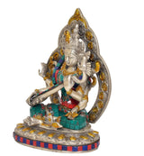 Tara Devi Messingstatue im Profil, Armhaltung mit Gebetsgestus, farbiges Gewand, silber-gold