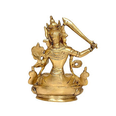 Brass Manjushree statue back view, seated figure with attendant motifs and halo