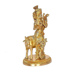 Brass khaniya statue: back view of flute-playing figure on cow, detailed ornaments