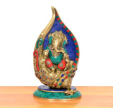 Brass Ganesha conch murti, front-facing pose, multicolor inlay on blue mosaic shell