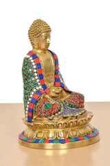 Brass Buddha statue side view, seated with Dhyan mudra and patterned robe