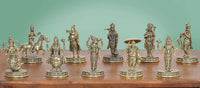 Ten brass Dashavatara figurines with ornate circular bases, standing in a row