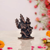 Copper Lakshmi Varaha idol, side view of seated deity on square base