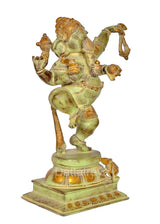 Brass dancing Ganesha idol statue, three-quarter view, gold trim on belt and crown