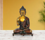Brass Buddha idol in Abhaya mudra, seated cross-legged, 9-inch height