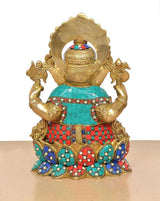 Ganesha brass idol rear view with teal back panel and red blue jeweled skirt