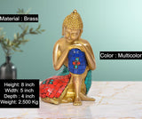 Brass Buddha sitting idol, 8 inch height, blue robe with red and teal mosaic accents